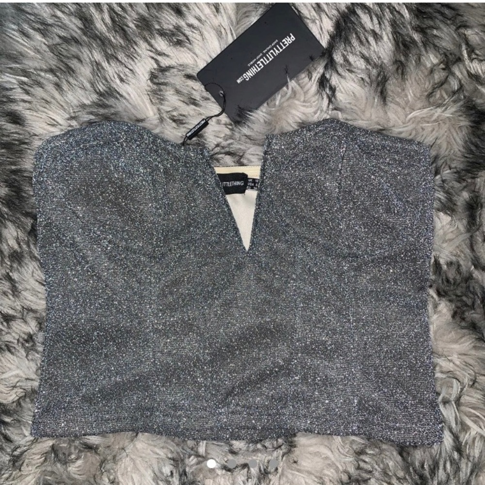 Pretty little thing, cute silver top